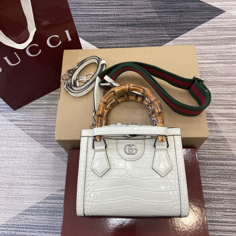 G*u*i top handle bags